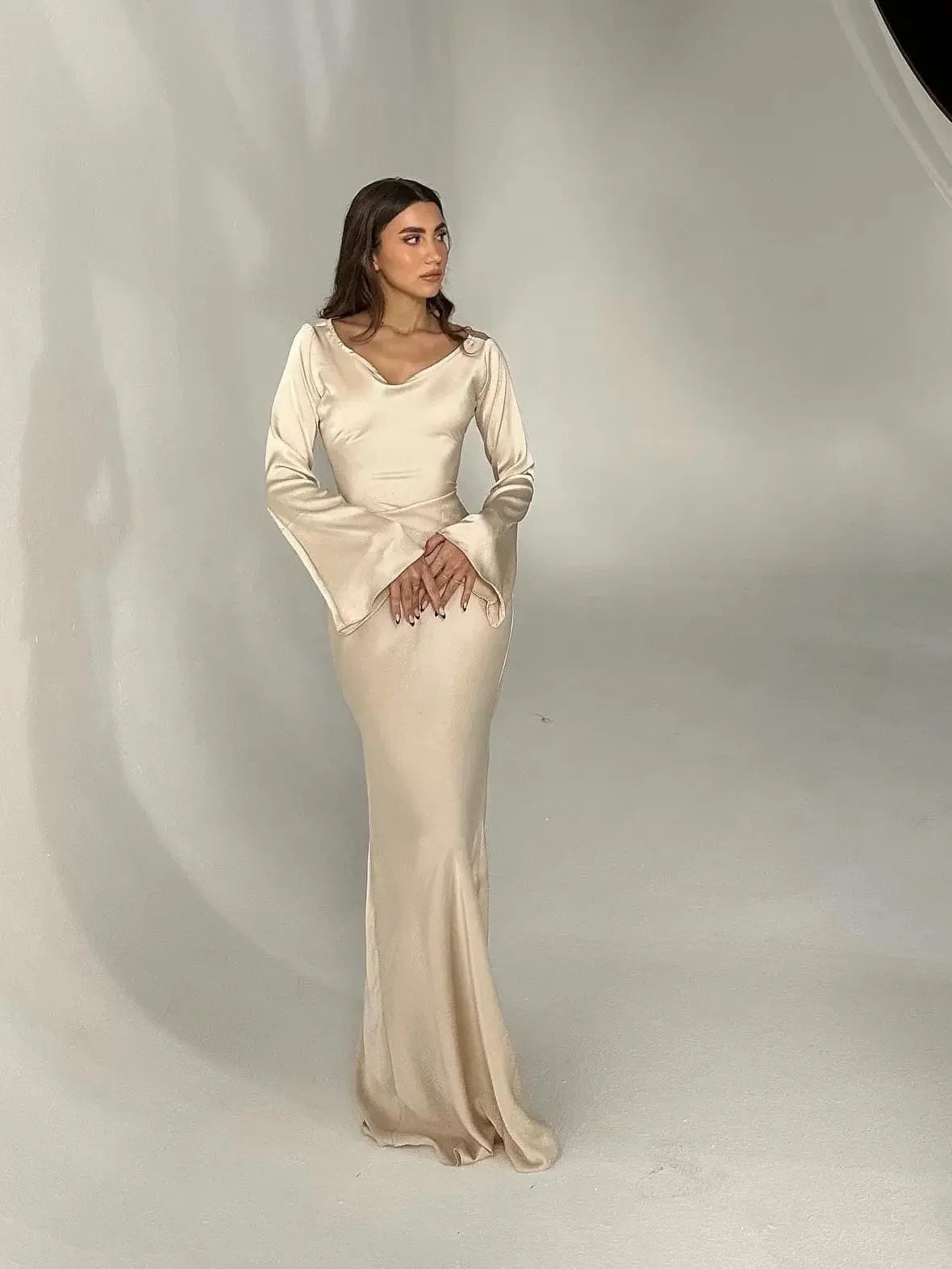 Women's satin fitted long-sleeve maxi dress with scoop neck and flared cuffs