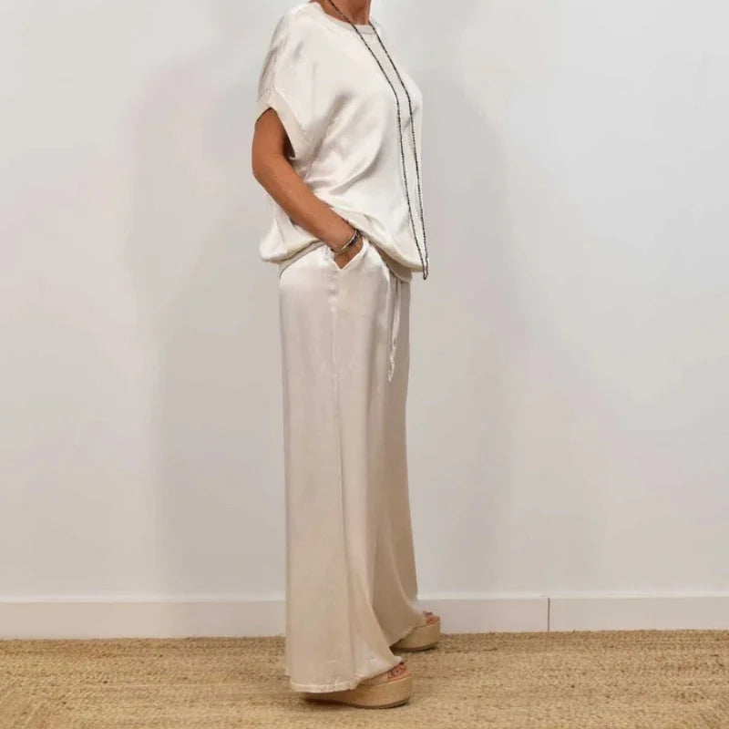 Women's satin matching set with round-neck cap-sleeve top and wide-leg trousers