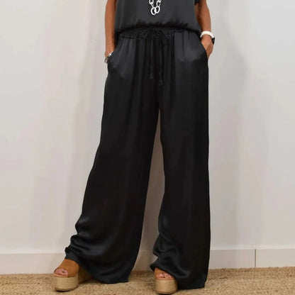 Women's satin matching set with round-neck cap-sleeve top and wide-leg trousers