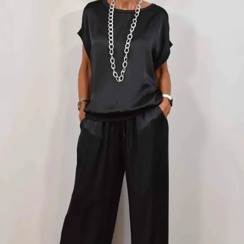Women's satin matching set with round-neck cap-sleeve top and wide-leg trousers