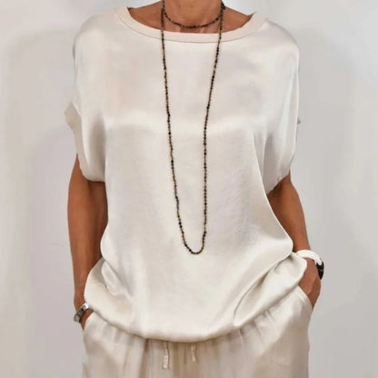 Women's satin matching set with round-neck cap-sleeve top and wide-leg trousers