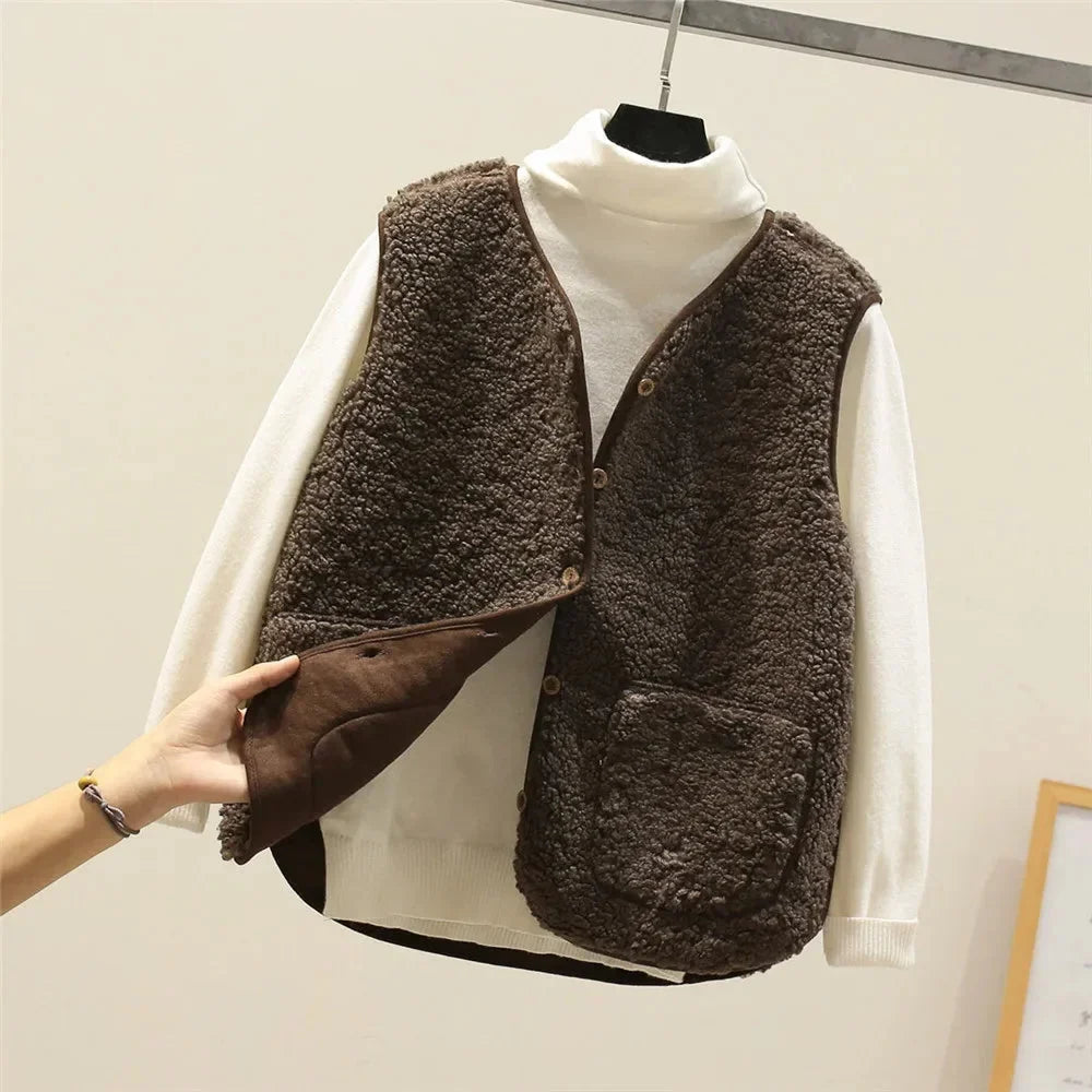 Women's sherpa vest with button-front V-neck and patch pockets