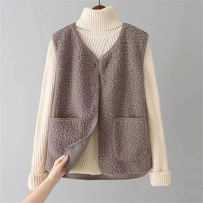 Women's sherpa vest with button-front V-neck and patch pockets