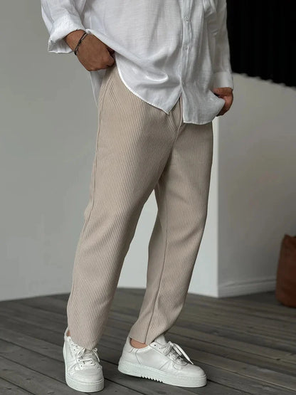 Women's soft pleated relaxed fit trousers with elastic waist and side pockets