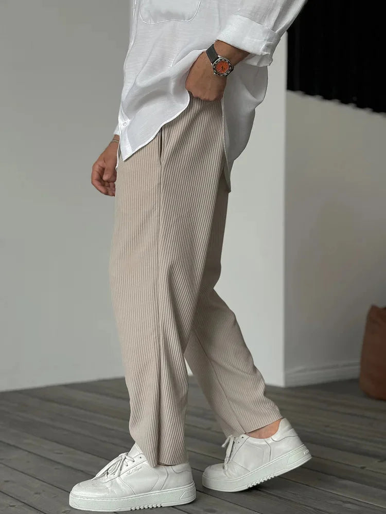Women's soft pleated relaxed fit trousers with elastic waist and side pockets