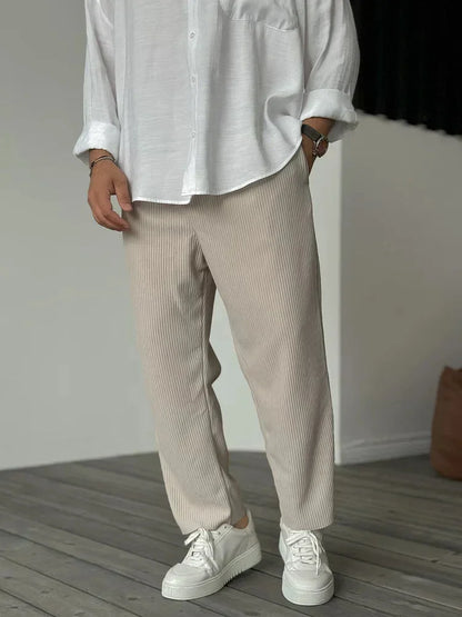 Women's soft pleated relaxed fit trousers with elastic waist and side pockets – Beige