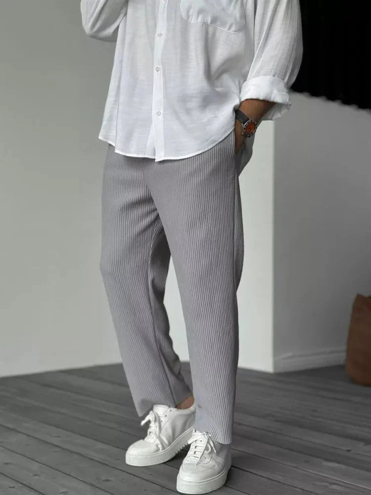 Women's soft pleated relaxed fit trousers with elastic waist and side pockets – Grey