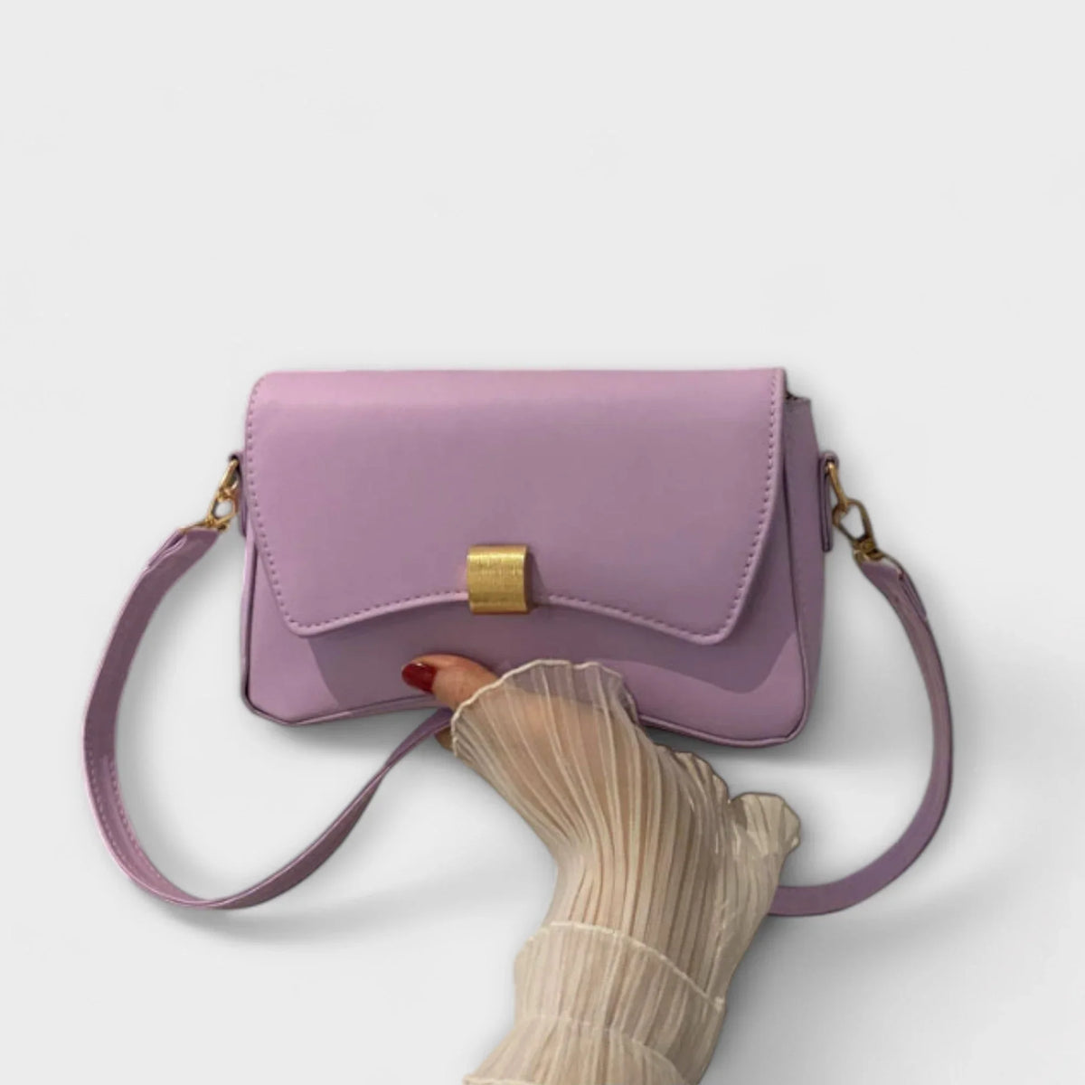 Women's solid color faux leather shoulder bag with flap closure and knotted strap