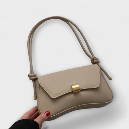 Women's solid color faux leather shoulder bag with flap closure and knotted strap – Terracotta
