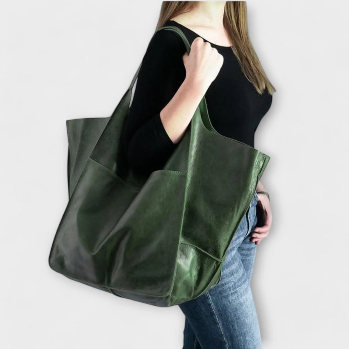 Women's spacious faux leather tote bag with two exterior slip pockets