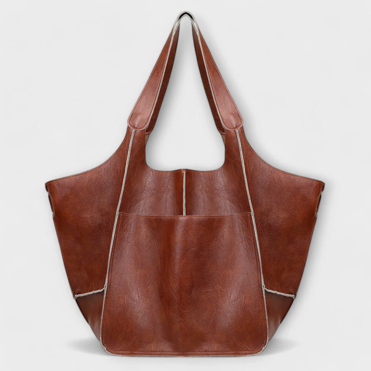 Women's spacious faux leather tote bag with two exterior slip pockets