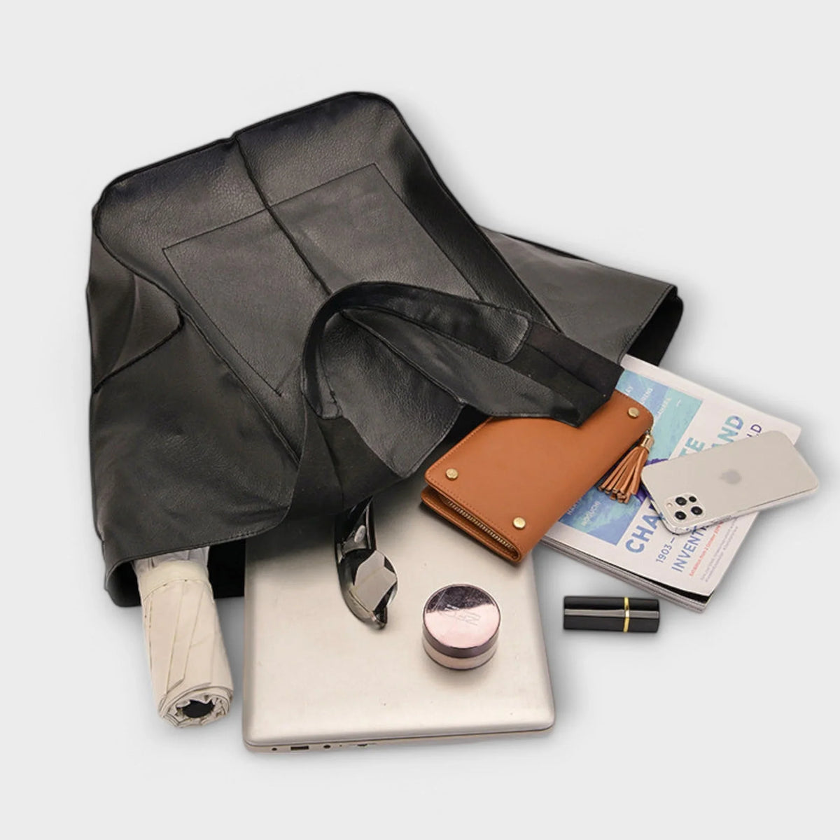 Women's spacious faux leather tote bag with two exterior slip pockets
