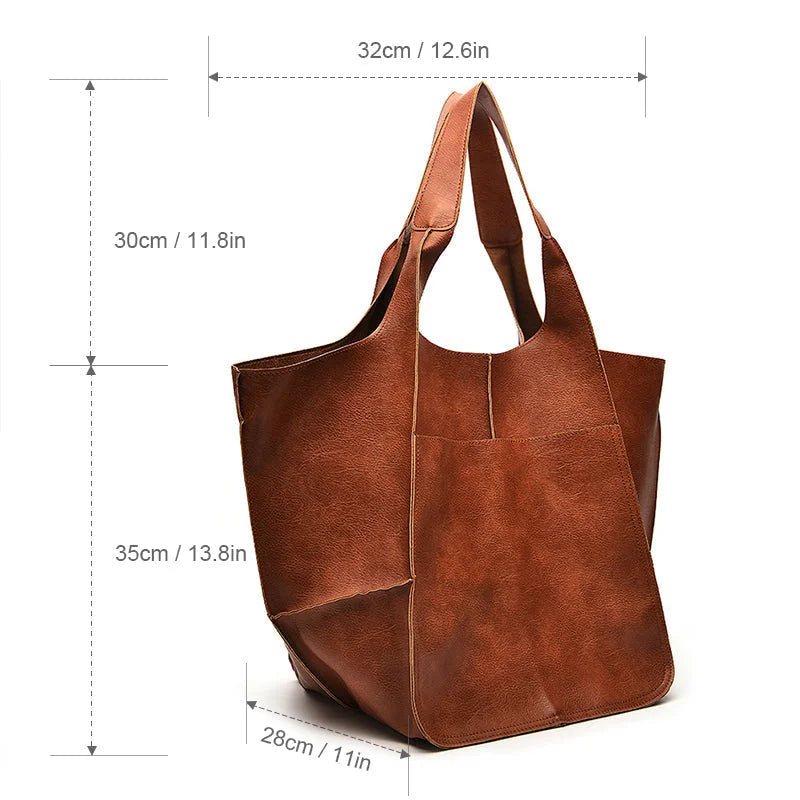 Women's spacious faux leather tote bag with two exterior slip pockets