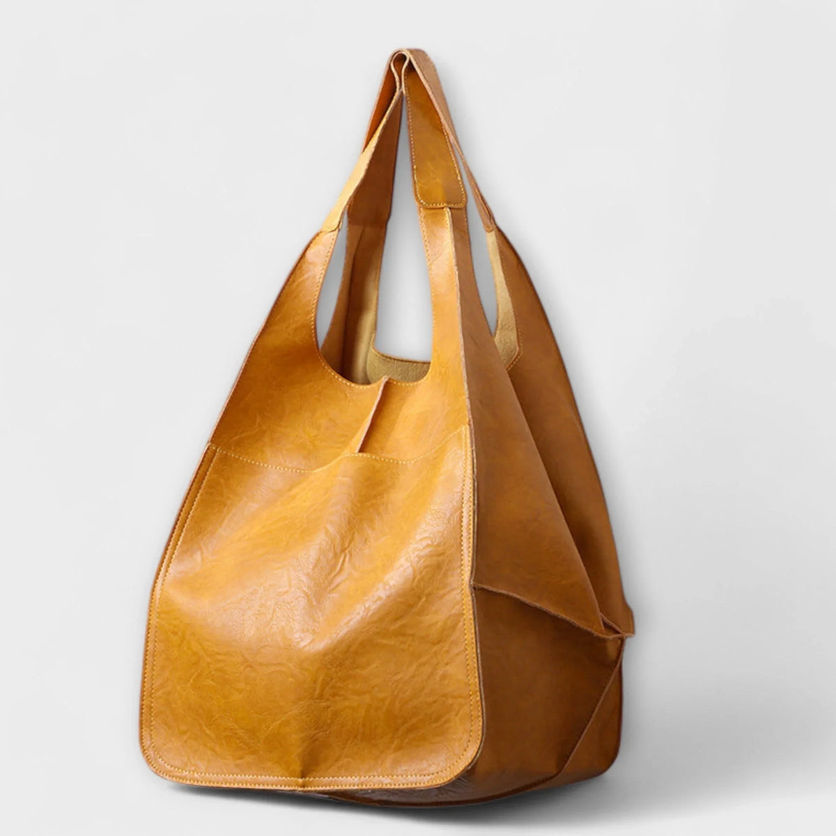 Women's spacious faux leather tote bag with two exterior slip pockets – Yellow