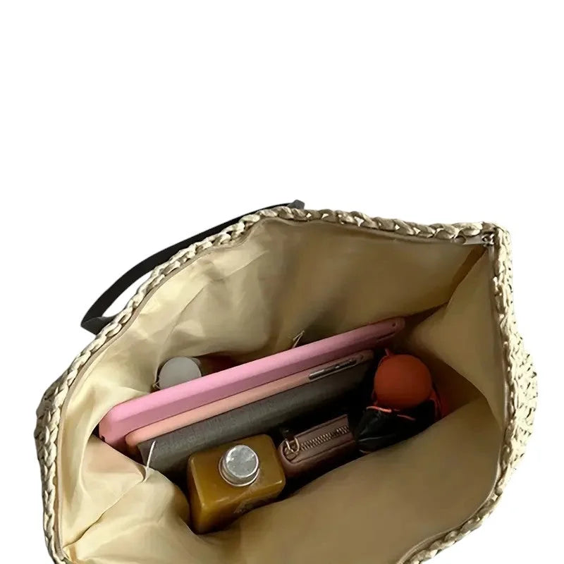 Women's spacious woven straw tote bag with double faux-leather straps