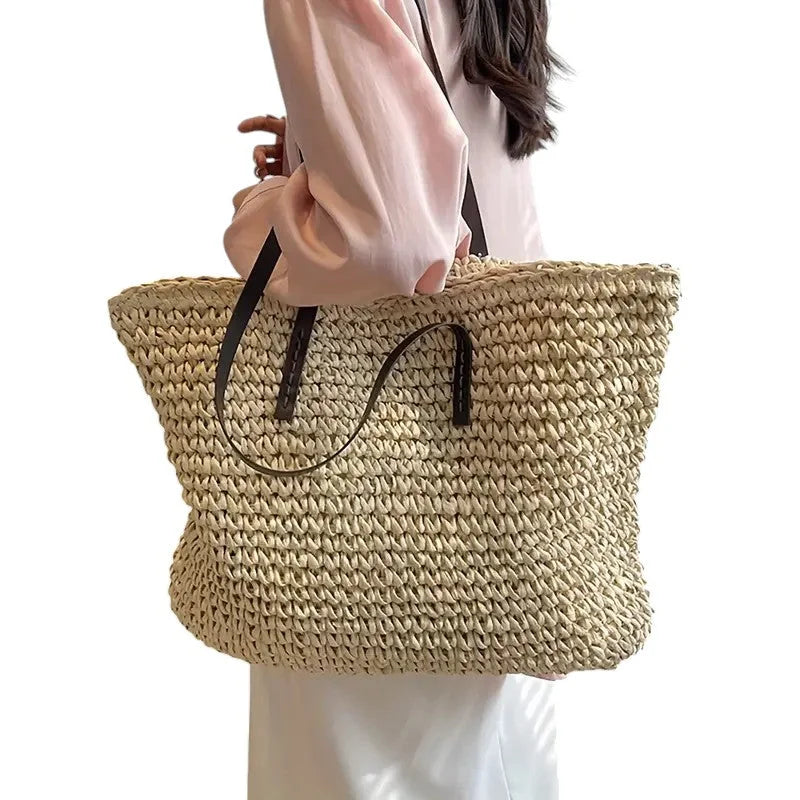 Women's spacious woven straw tote bag with double faux-leather straps