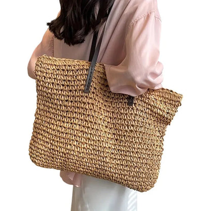Women's spacious woven straw tote bag with double faux-leather straps