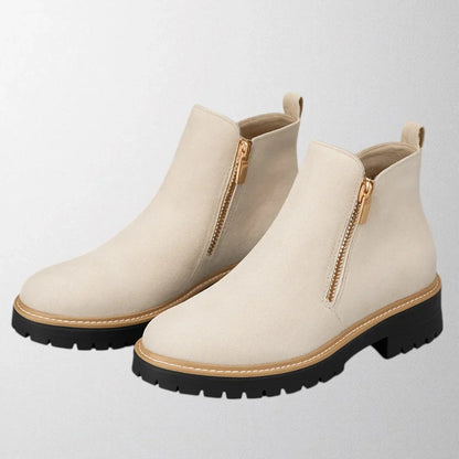 Women's suede chunky-sole ankle boot with round toe and tone side zip