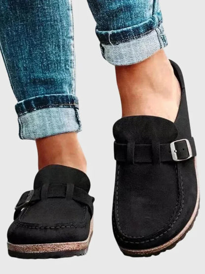 Women's suede comfort clogs with buckled strap and contrast stitching – Black
