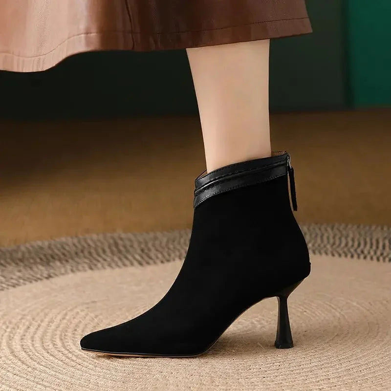 Women's suede pointed-toe ankle boots with back-zip and sculptural heel