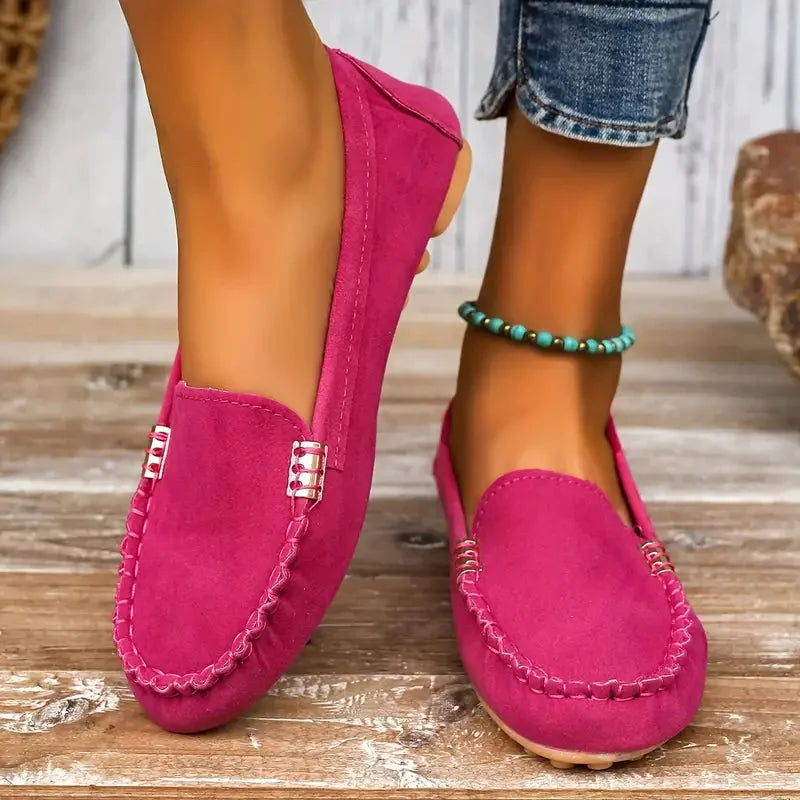 Women's suede slip-on flat loafers with moc-toe stitching and metal hardware – Pink