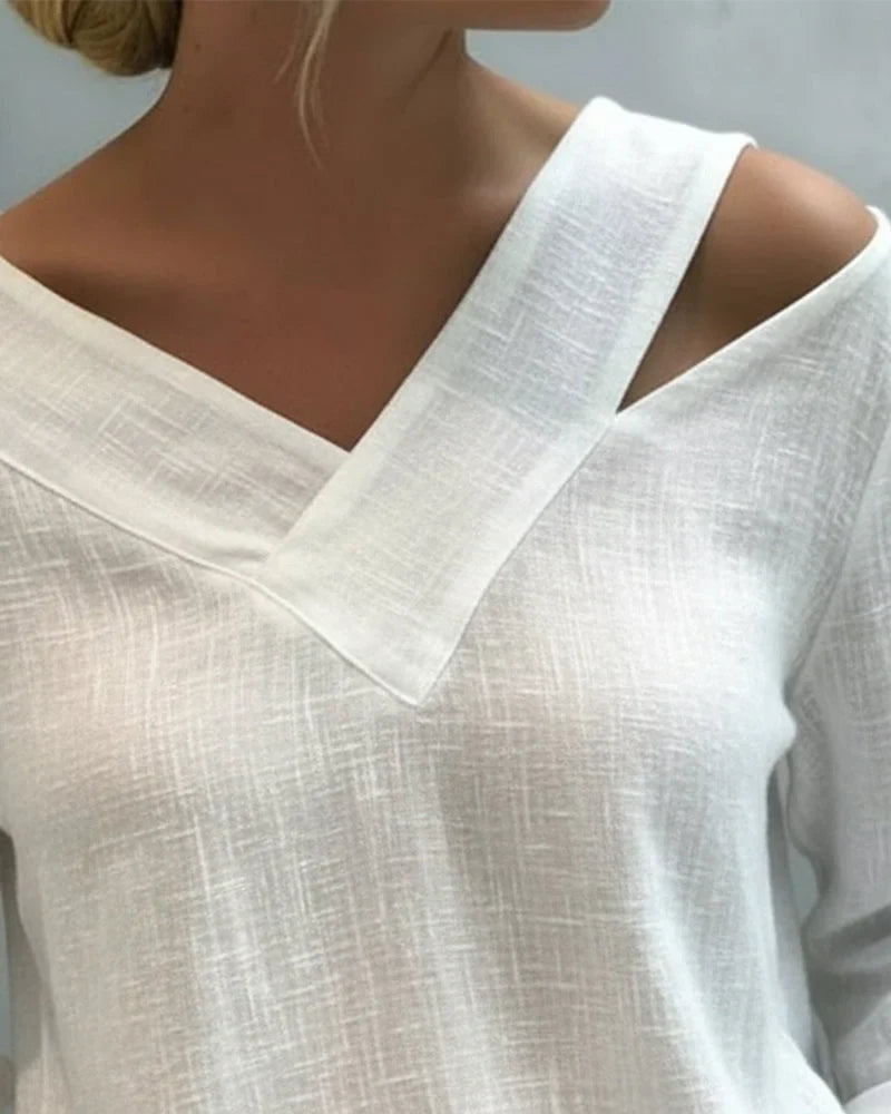 Women's textured long-sleeve top with asymmetric V-neck