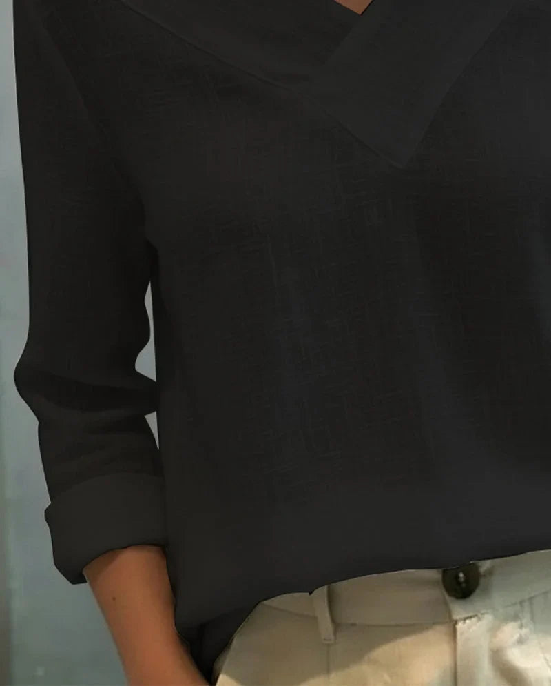 Women's textured long-sleeve top with asymmetric V-neck