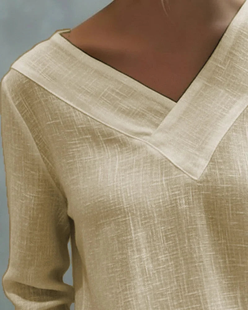 Women's textured long-sleeve top with asymmetric V-neck