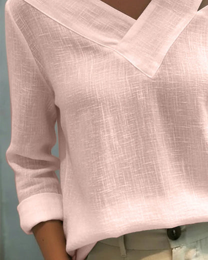 Women's textured long-sleeve top with asymmetric V-neck