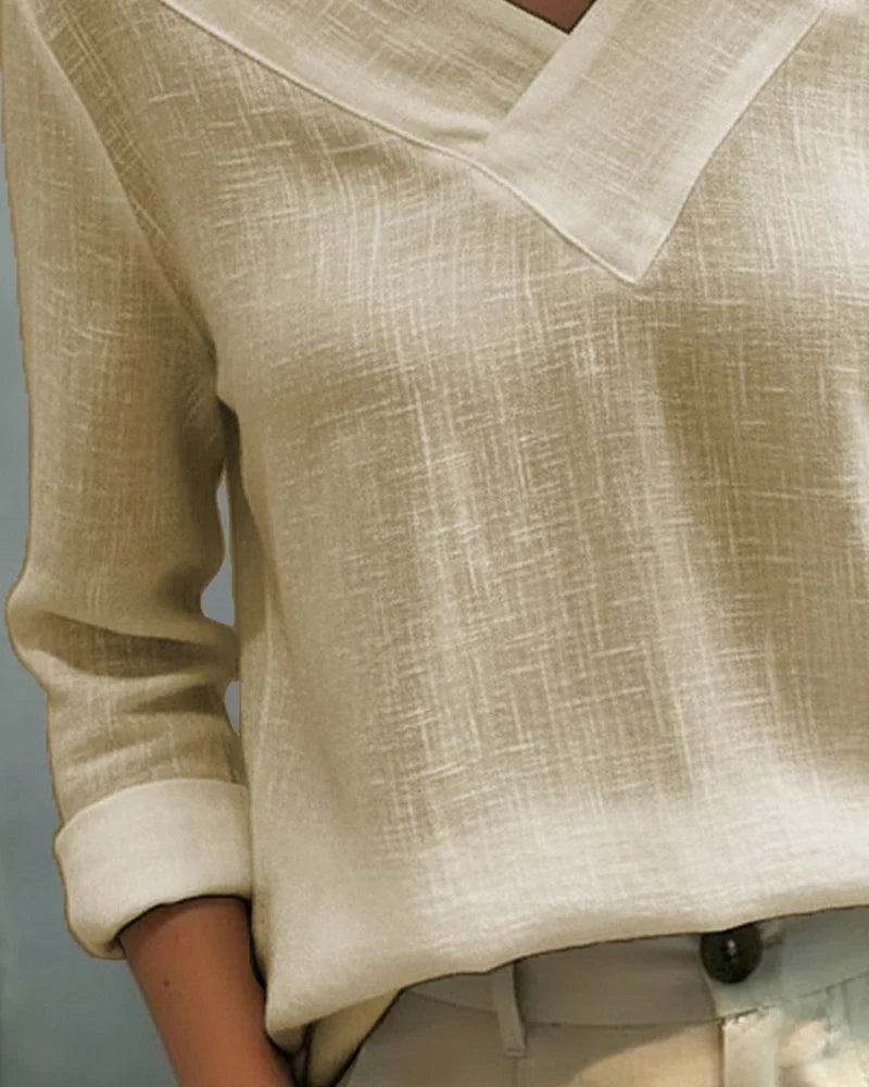 Women's textured long-sleeve top with asymmetric V-neck