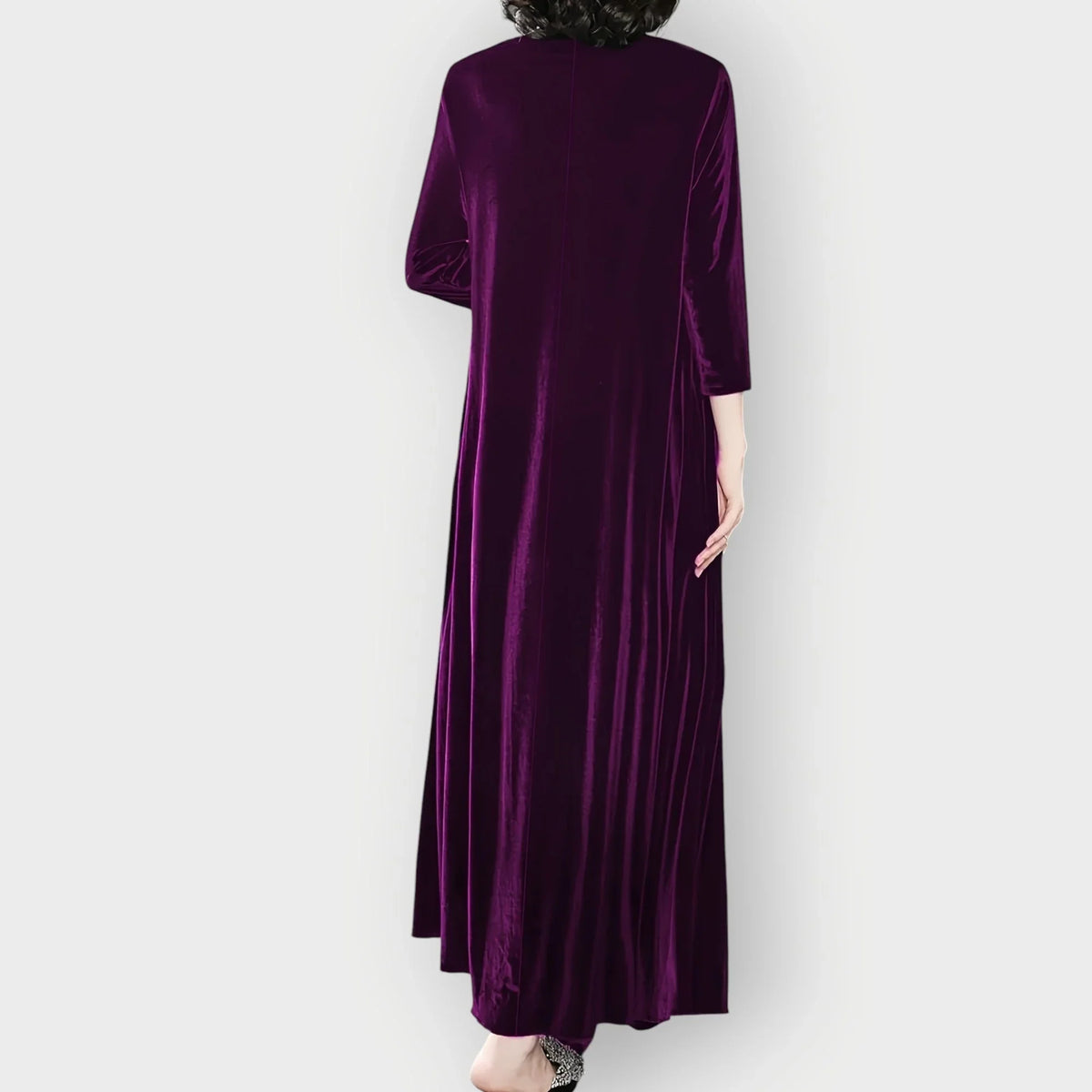 Women's velvet flowy maxi dress with long sleeves and round neck