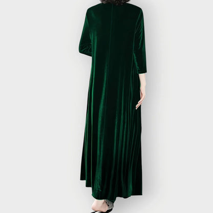 Women's velvet flowy maxi dress with long sleeves and round neck