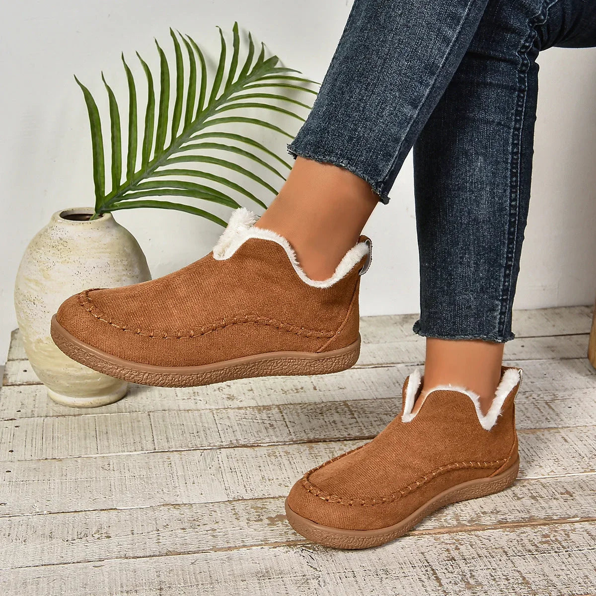 Women's warm fur-lined slip-on ankle boots with thick sole and moc-toe stitching