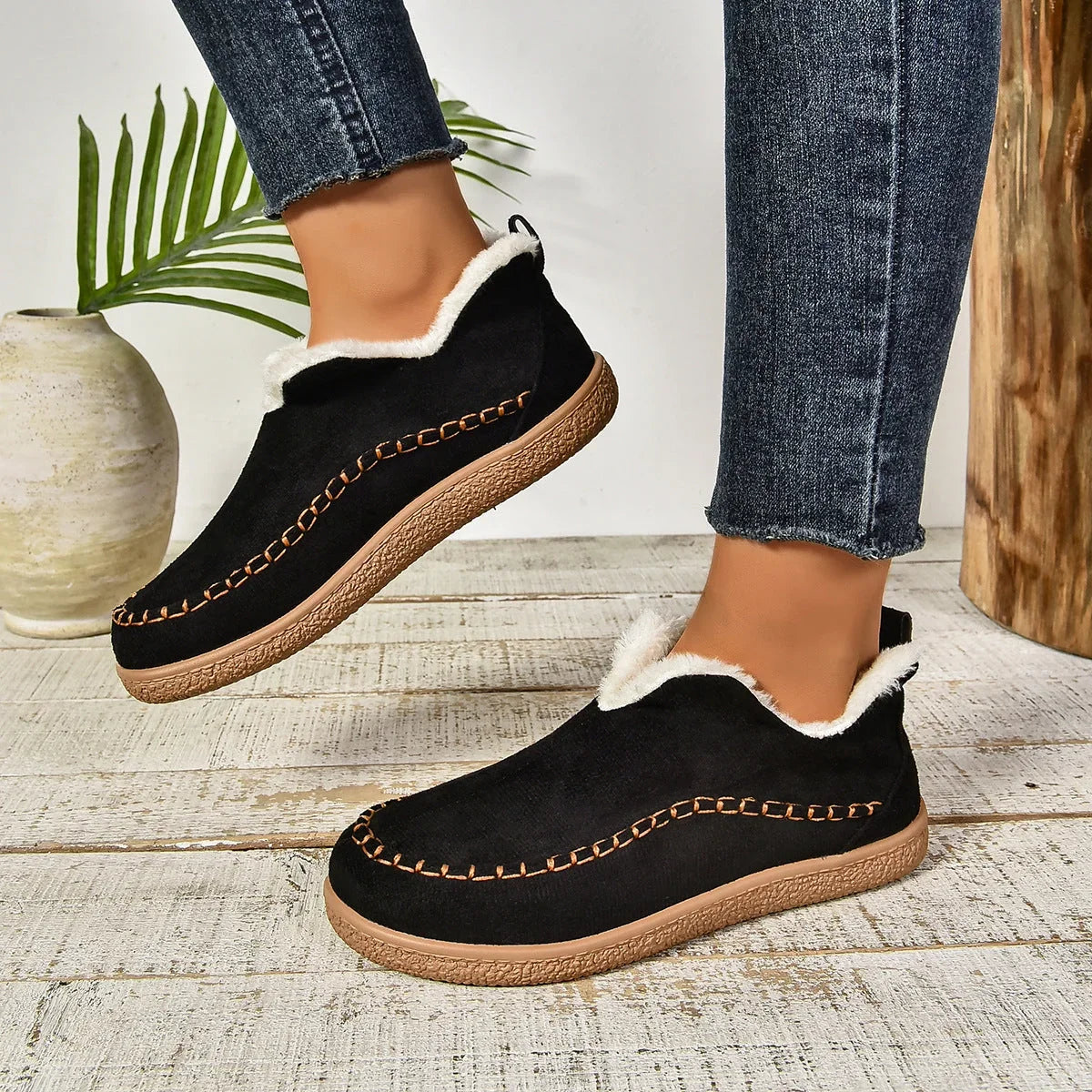 Women's warm fur-lined slip-on ankle boots with thick sole and moc-toe stitching