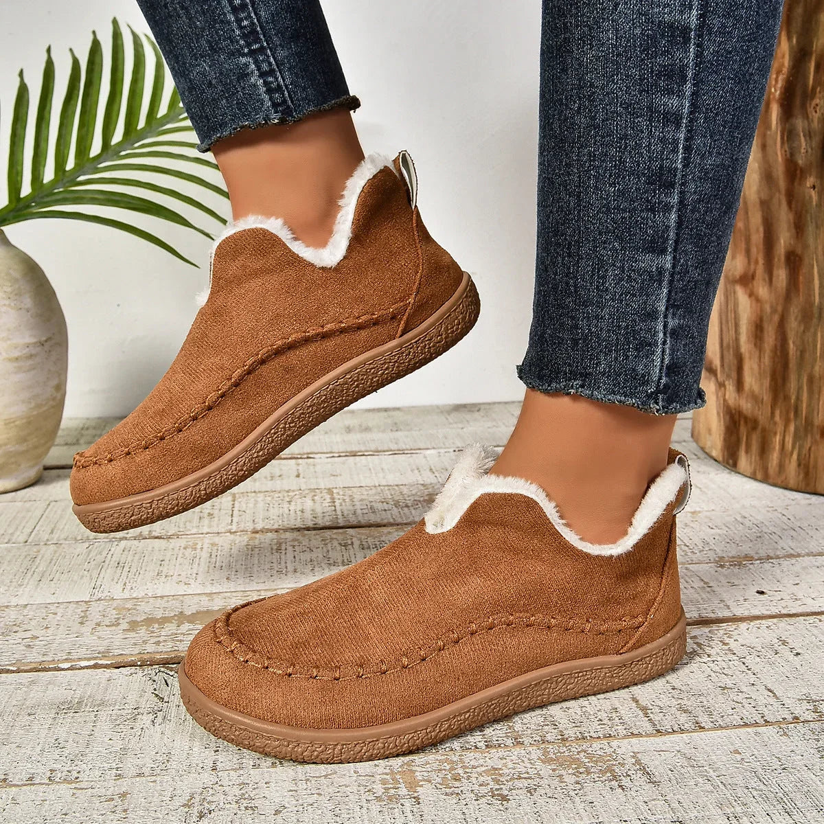 Women's warm fur-lined slip-on ankle boots with thick sole and moc-toe stitching