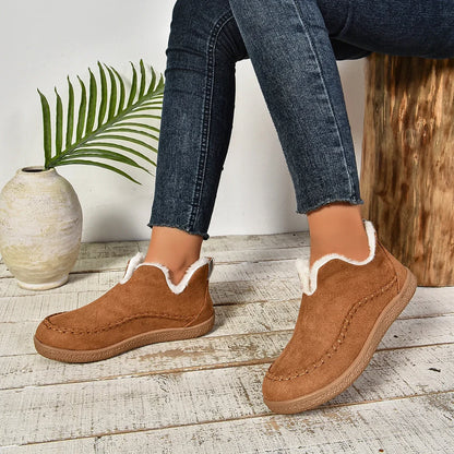 Women's warm fur-lined slip-on ankle boots with thick sole and moc-toe stitching