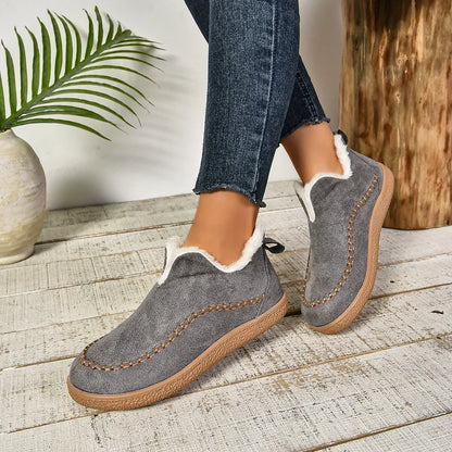 Women's warm fur-lined slip-on ankle boots with thick sole and moc-toe stitching