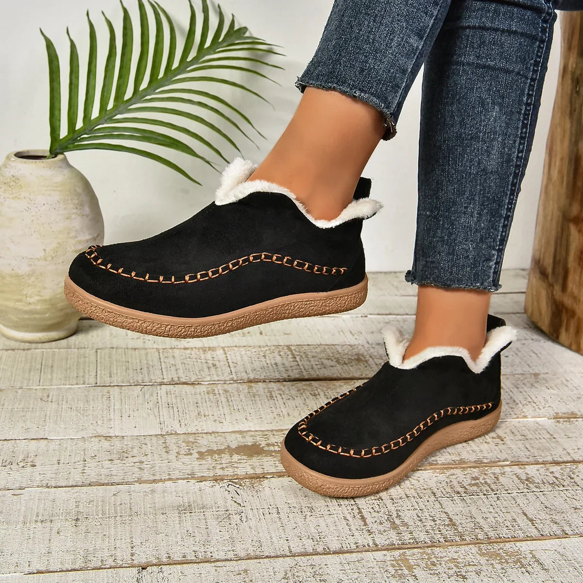 Women's warm fur-lined slip-on ankle boots with thick sole and moc-toe stitching