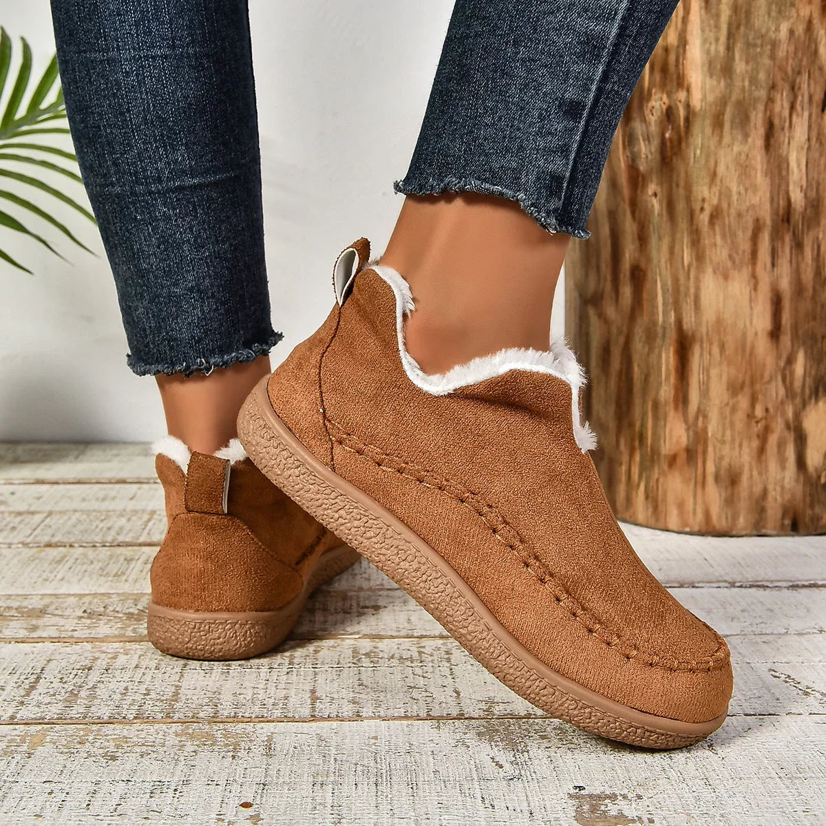 Women's warm fur-lined slip-on ankle boots with thick sole and moc-toe stitching