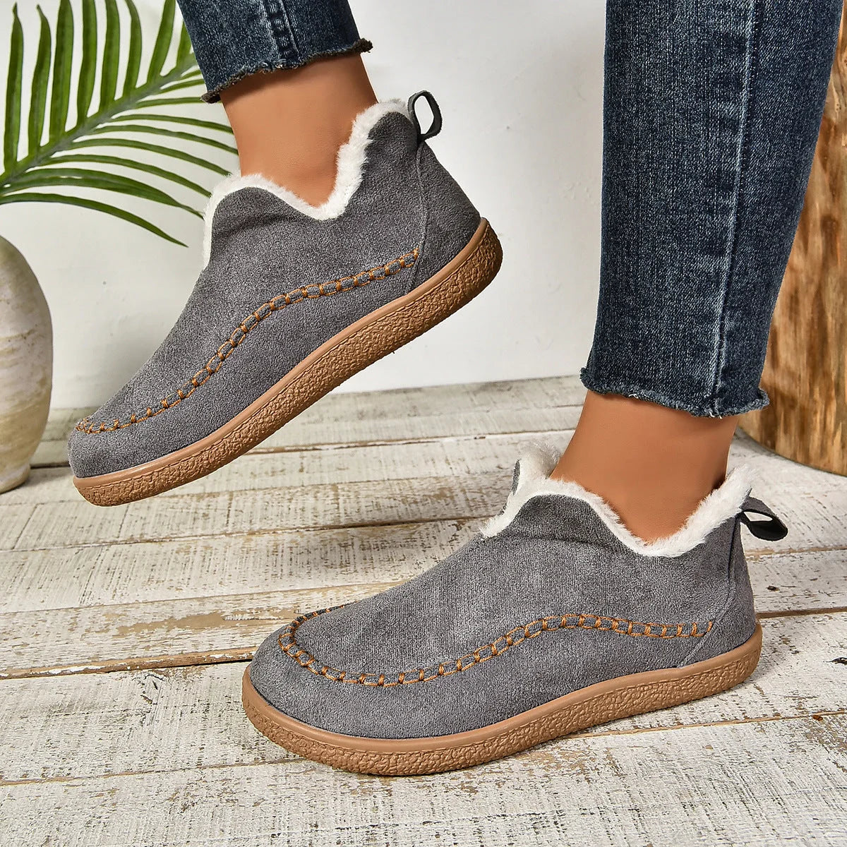 Women's warm fur-lined slip-on ankle boots with thick sole and moc-toe stitching