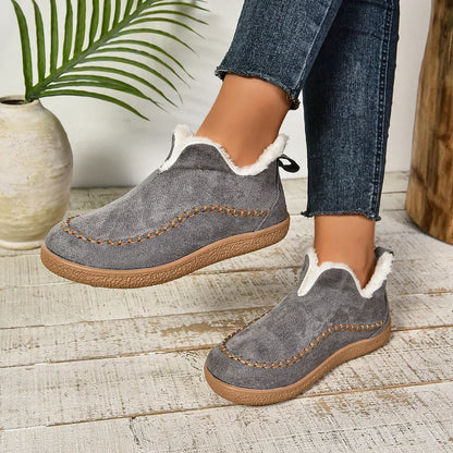 Women's warm fur-lined slip-on ankle boots with thick sole and moc-toe stitching