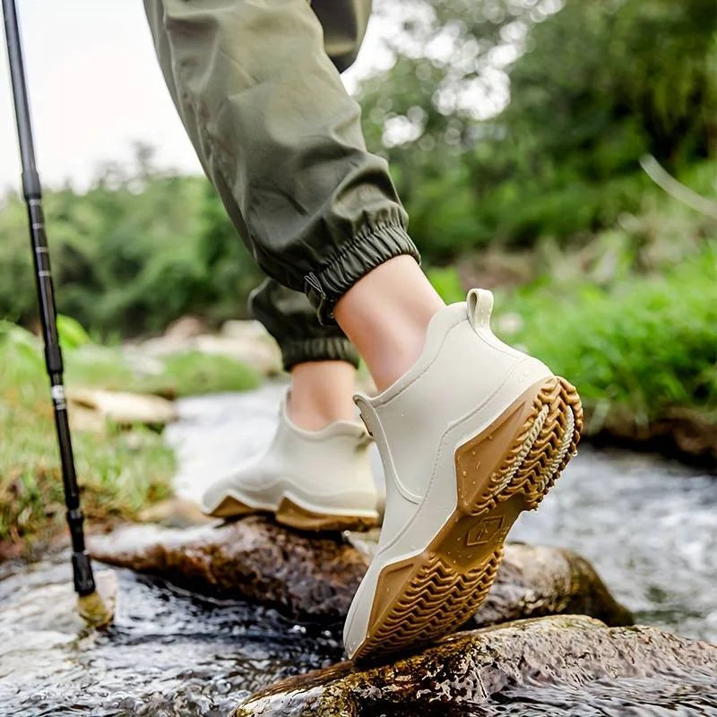 Women's waterproof comfort boots with pull-on tab and contrast sole