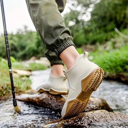 Women's waterproof comfort boots with pull-on tab and contrast sole