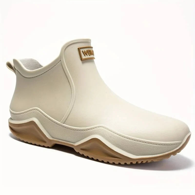 Women's waterproof comfort boots with pull-on tab and contrast sole
