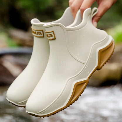 Women's waterproof comfort boots with pull-on tab and contrast sole