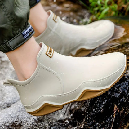 Women's waterproof comfort boots with pull-on tab and contrast sole