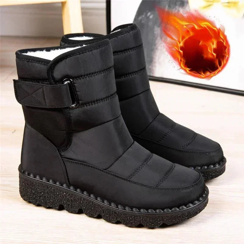 Women's waterproof quilted mid-calf winter boots with velcro strap closure