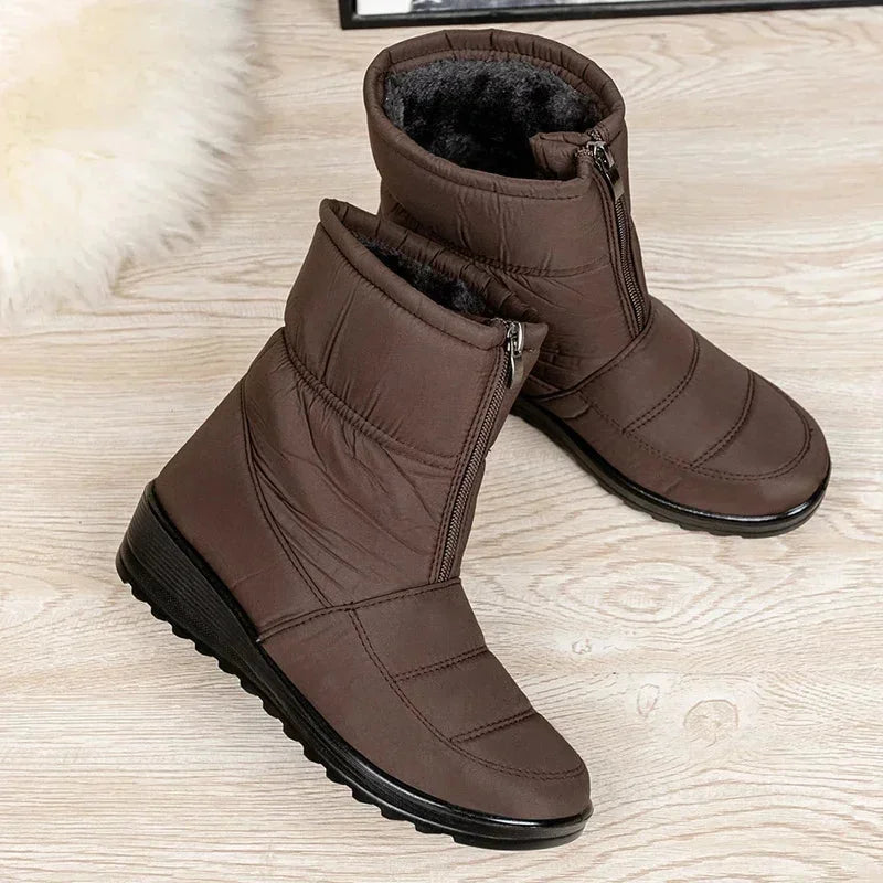 Women's waterproof quilted mid-calf winter boots with velcro strap closure