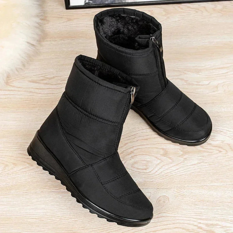 Women's waterproof quilted mid-calf winter boots with velcro strap closure