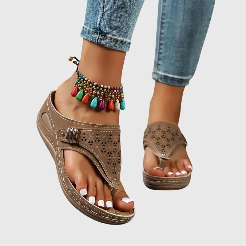 Women's wedge toe-loop slip-on sandals with quilted footbed and laser-cut detail